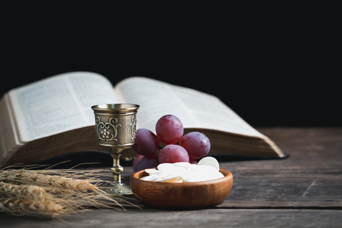 Concept of Eucharist or holy communion of Christianity. Eucharist is sacrament instituted by Jesus. during last supper with disciples. Bread and wine is body and blood of Jesus Christ of Christians.